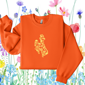 Wildflower Bucking Horse~ Orange Gildan Sweatshirt (pre-order) - My Wyo Designs