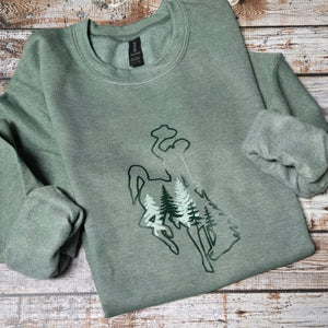 Forest Heather Green sweatshirt with trees embellished on the front